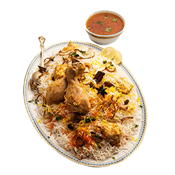 chicken biryani in a plate with curry 
